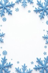Wall Mural - blue snowflakes arranged in a frame shape clean white background, winter-themed frame for holiday gr