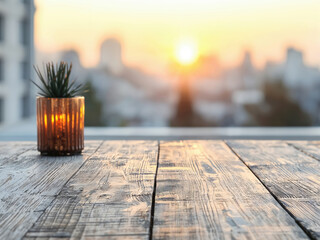 Poster - Empty wooden table with a candle on a rooftop at sunset