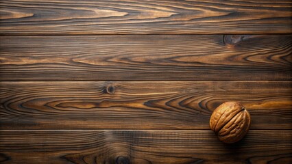 Poster - Rustic Wooden Background with a Single Walnut Shell in Focus