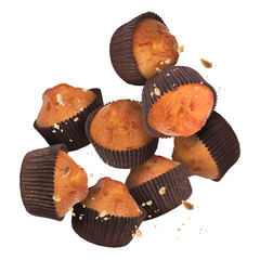 Wall Mural - Delicious muffins in air on white background