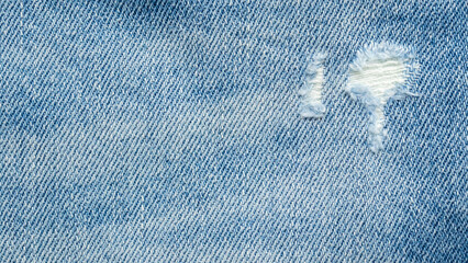 denim blue jeans torn fashion design texture close up background