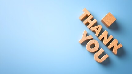 Poster - Elegant  Thank You  message created from wooden blocks in a minimalist modern composition set against a vibrant blue background with ample negative space