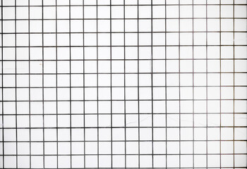 white square tiles on the wall , texture