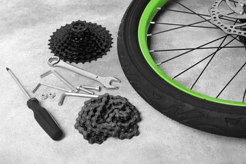 Sticker - Parts of bicycle and tools on grey background, closeup