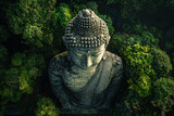 In the green forest there is an ancient giant Buddha statue