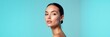© Makaron - A stunning close up of a serene woman against a soft blue backdrop, perfect for beauty, wellness, and skincare branding.