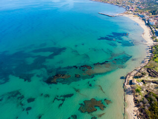 Background image of the turquoise sea. Deep sea and corals. Aerial drone shot of turquoise water.