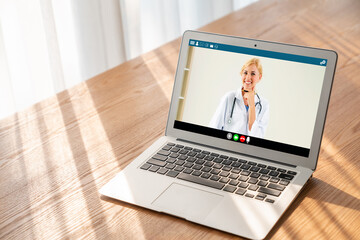 Doctor video call online by modish telemedicine software application for virtual meeting with patient