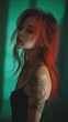 © Taras Vykhopen - Mysterious girl with flowing red hair and tattoo in dramatic portrait against soft green backdrop