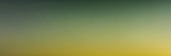 Canvas Print - green and yellow sky