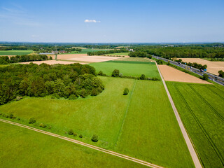 Wall Mural - farmland from above. aerial view over green fields