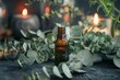 © juliars - Dark glass essential oil bottle standing on a dark wooden surface surrounded by eucalyptus leaves with lit candles in the background