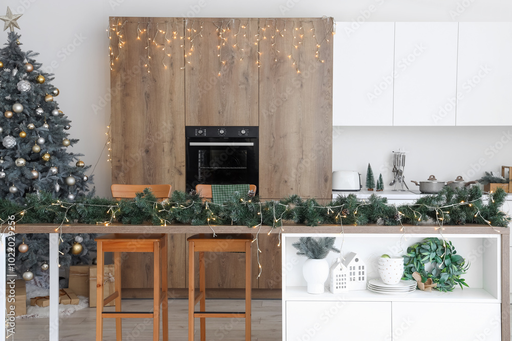 Interior of modern kitchen with Christmas decor