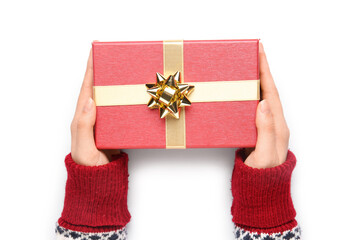 Female hands with Christmas gift isolated on white background, closeup