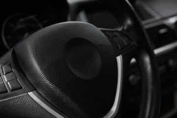 Wall Mural - Steering wheel inside modern car, closeup view