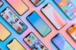 © Анатолий Сав - A collection of smartphones showcases various open stories and short videos on vibrant, colorful backgrounds, illustrating digital engagement. Generative AI