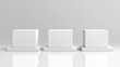© chesleatsz - Three White Square Platforms with Reflective Surface