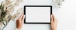 © Rainister - Hands holding a tablet horizontally, with an empty white screen ready for input, shot against a white background