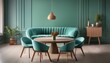 © Jay Nandu - mint-colored chairs encircling a round wooden table. The room, defined by a green wall with