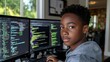 © BOJOShop - Young Black Boy Coding on Computer  Digital Skills  STEM Education