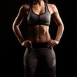 © GeorgV - Fit Woman in Workout Gear Posing Confidently