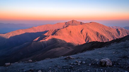 Wall Mural - majestic mountain range in vibrant sunset hues