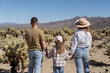 © Julija - Family in Joshua tree National Park, Cholla cactus garden. USA, California