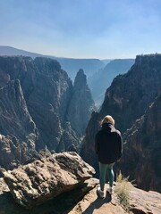 A woman at The view of Black Canyon National Park in USA