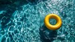© kayudamar - Yellow Inflatable Ring Floating in a Blue Swimming Pool