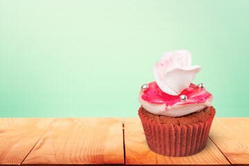 Wall Mural - Birthday sweet tasty cupcake with berries