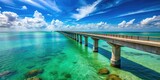 Scenic view of Seven Mile Bridge spanning turquoise waters in the Florida Keys under a blue sky