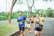 © Odua Images - female asian athlete on marathon race at outdoor track
