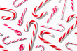 © funkyfrogstock - Top view of assorted red and white candy canes on white background