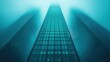 © Ignacio Ferrándiz - Blue glass skyscraper into mist.