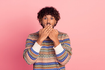 Wall Mural - Portrait of nice young man arms cover mouth wear pullover isolated on pink color background