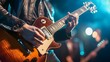 © DonChanu - Close Up of Guitarist Playing Electric Guitar on Stage