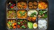 © savittree - Indian lunchbox with assorted dishes, colorful, rich in texture, neatly arranged compartments.