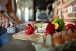 © Geber86 - Woman cracking an egg for healthy breakfast preparation in kitchen