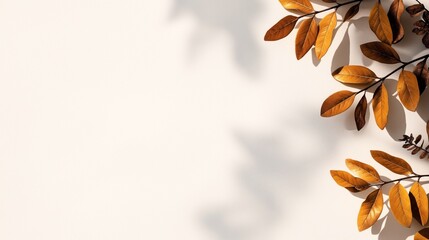 Canvas Print - Autumn-themed arrangement with golden brown leaves casting shadows on a light beige background.