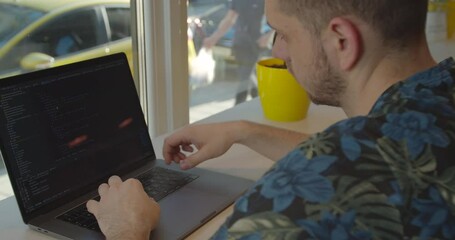 Close up Man coding html and programming on screen Monitors, development web, developer.