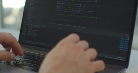 Closeup coding on screen, Man hands coding html and programming on screen laptop, development web, developer.