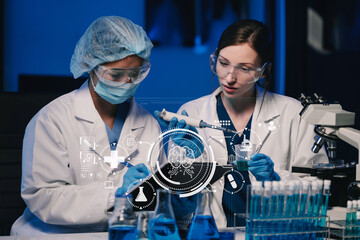 Wall Mural - team of biochemical research scientists working with a microscope for vaccine development