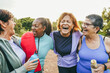 © DisobeyArt - Multiracial senior women having fun together after yoga class outdoor - Healthy lifestye and mature people concept - Main focus on center latin female face