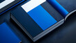 © HQAsset - Close-up of a Hardcover Book with Blue and White Cover on a Dark Background,  Illustrating a Minimalist and Modern Design Aesthetic