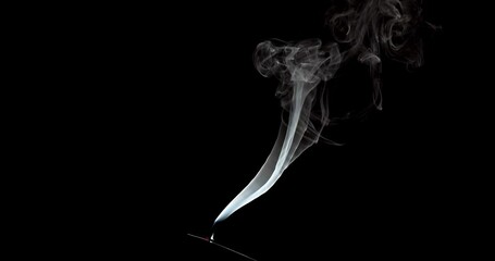 Wall Mural - Real smoke on a black background. Thin Flexible Trickle of Real Smoke. Colorful real smoke rises up. Ideal for background or over-layer with blending mode add, screen, lighten.