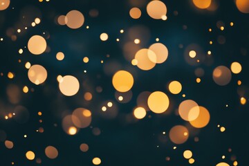 Fototapete - A beautiful golden light on a dark background with bokeh.