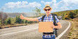 © Ljupco Smokovski - Male tourist with backpack hitchhiking