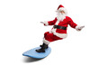 © Ljupco Smokovski - Santa claus riding a surfboard