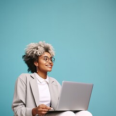 Poster - Female looking upward while reading communicating online using silver laptop.