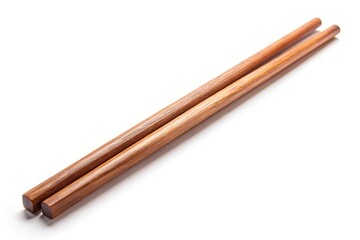 isolated wooden chopsticks on white background with shallow depth of field